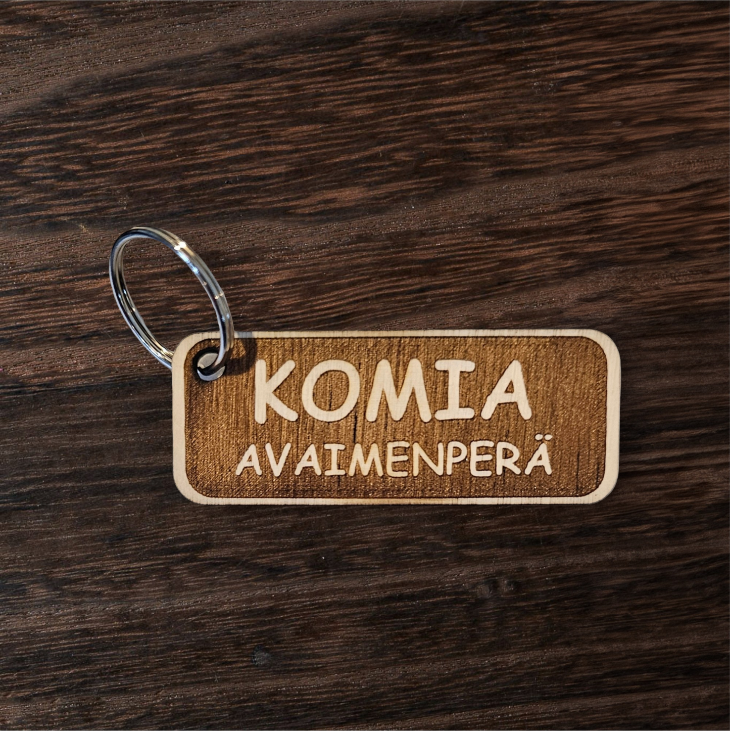 Puinen avaimenperä, Komia avaimenperä